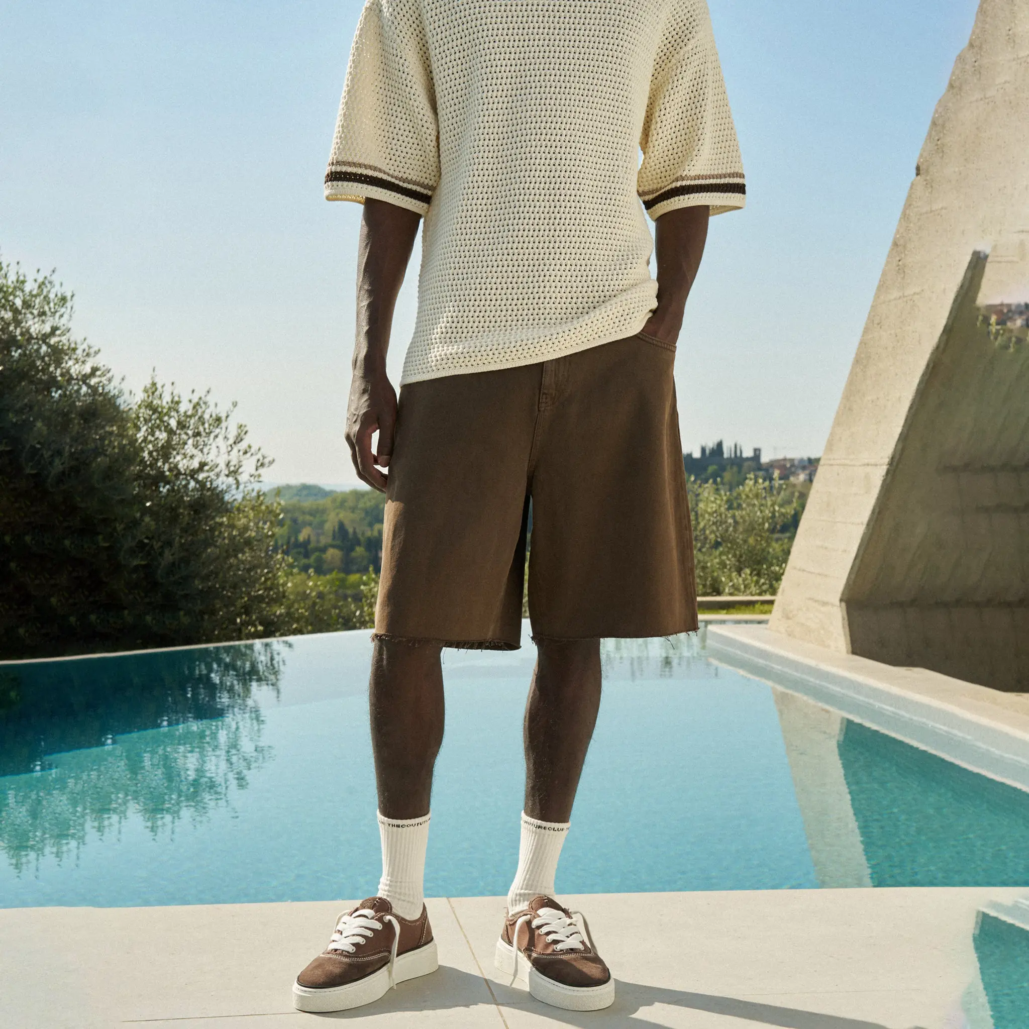 Front View of View of The Couture Club Raw Edge Brown Denim Shorts